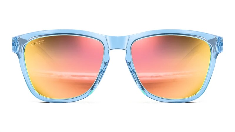 3D render of the same light blue translucent sunglasses with orange-to-pink mirror lenses, front view