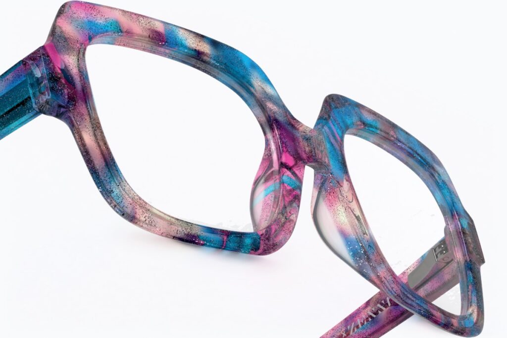 3D render close-up of blue and pink marbled acetate square eyeglasses